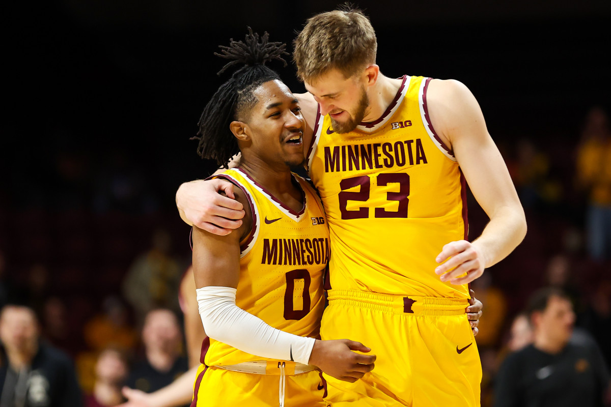 Elijah Hawkins and Parker Fox embrace